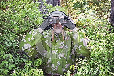 The observer in the woods Stock Photo