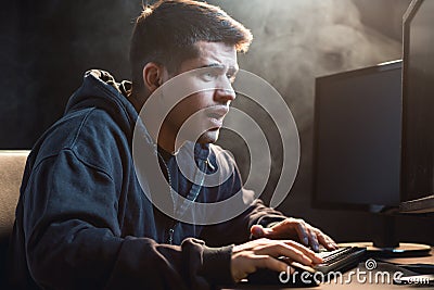 Obsessed man and computer Stock Photo