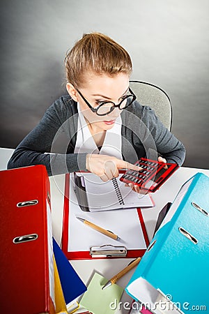 Obsessed secretary at work. Stock Photo