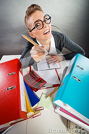 Obsessed secretary at work. Stock Photo