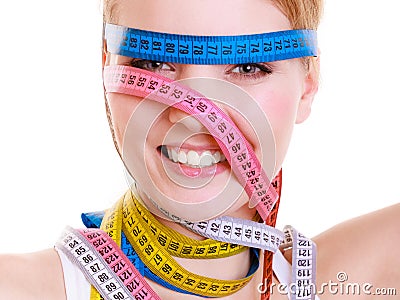 Obsessed sporty fit woman with measure tapes. Time for diet slimming. Stock Photo