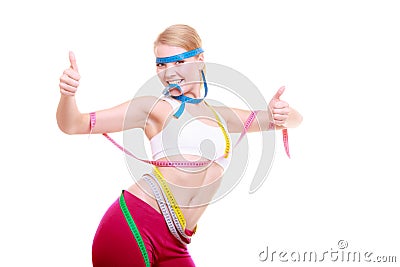 Obsessed woman with colorful measure tapes Stock Photo