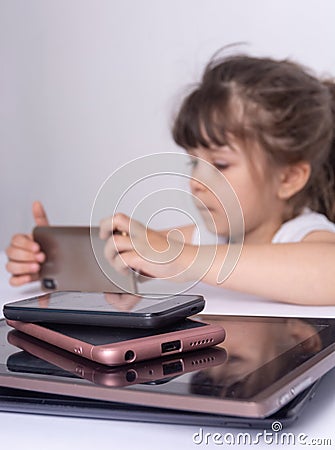 Obsession and addiction. Children technology overuse. Stock Photo