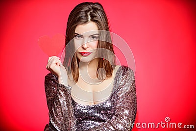 Obsession concept. Love from first sight. Woman in stylish dress hold symbol love. Fall in love. Romantic mood. Girl in Stock Photo