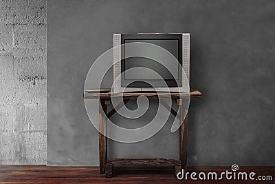 Obsolete tv on old wooden in empty living room Stock Photo