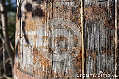 Obsolete wooden barrel with rust pattern, soft focus texture Stock Photo