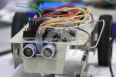 Obstacle avoiding robot made using programmable micro controller and ultrasonic sensor along with dc motors and wheels as a STEM Stock Photo