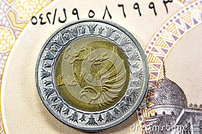 Obverse side of Egyptian 1 LE EGP One Egyptian pound coin on Egyptian banknote, Translation of Arabic (Police day 70 years Stock Photo