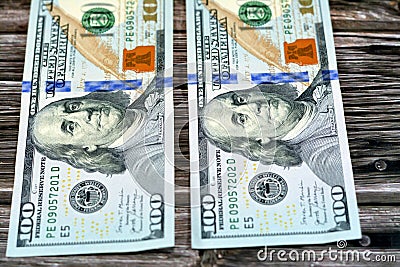 Obverse side of 100 one hundred dollars bill banknote with the portrait of president Benjamin Franklin, American money banknote, Stock Photo