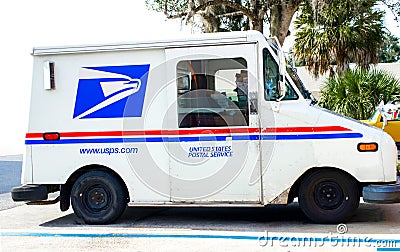 Ocala, Florida, USA November 2, 2023 USPS truck delivering mail on suburban street parked in occupied space. red white and blue Editorial Stock Photo