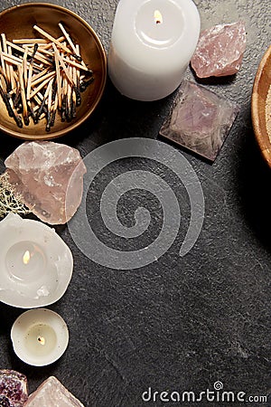 Burning candles and crystals for magic ritual Stock Photo