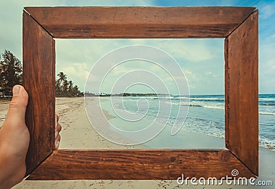 Ocean beach landscape in photoframe for memory. Tropical climate nature and fantastic view on calm blue waves Stock Photo