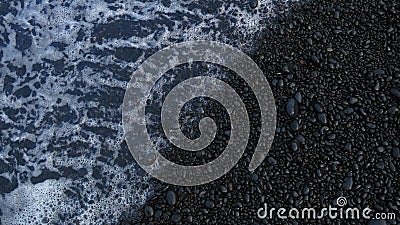 Ocean on a black sand beach Stock Photo