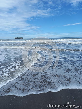 Ocean bright and blue skies Stock Photo