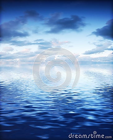 Ocean with calm waves background with dramatic sky Stock Photo