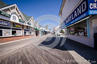 Ocean City, Maryland - Empty boardwalk with no people and closed restaurants and stores in early spring during a Editorial Stock Photo