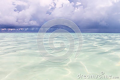 The ocean before the rain. Summer juicy seascape. The Caribbean Sea with turquoise water, . Stock Photo