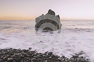 Ocean rock by morning Stock Photo