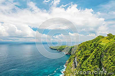 Ocean rocks turquoise blue ocean Nusa Penida Island Bali Stock Photo