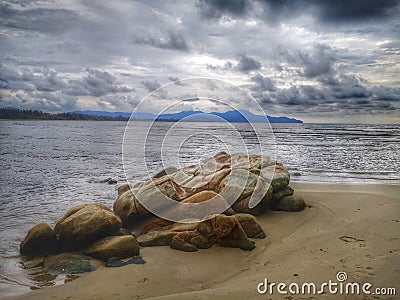 Water reflection on the sea shore landscape on the sea shore with blue sky above. Stock Photo