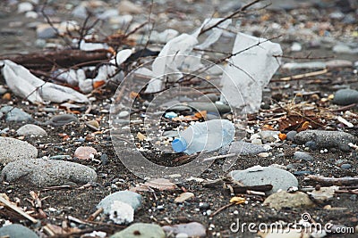 Ocean water pollution with plastic waste and water bottles Stock Photo