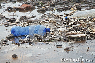 Ocean water pollution with plastic waste and water bottles Stock Photo