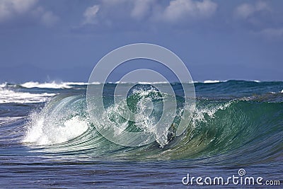 Ocean Wave Closeup Water. Ocean wave closeup detail of upright crashing hollow breaking water. Stock Photo