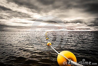 Ocean yellow buoy in Brittany Stock Photo