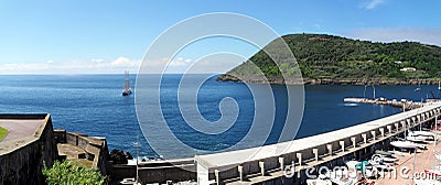 Oceanview from the Fort of SÃ£o SebastiÃ£o, partial view of the marina and Mount Brazil, Angra do HeroÃ­smo, Portugal Stock Photo