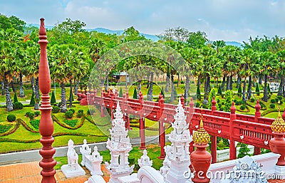 Ochre bridge in Rajapruek park, Chiang Mai, Thailand Stock Photo