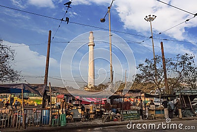 Ochterlony Monument or Shaheed Minar a famous landmark in the city of Kolkata as seen from a street near Chowringhee Esplanade are Editorial Stock Photo