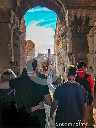 Tourists follow guide into Colosseum in Rome Editorial Stock Photo