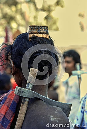 Tribal man with axe on his back going to work Gond tribe. Konda gara Village Bastar Chhattisgarh Editorial Stock Photo