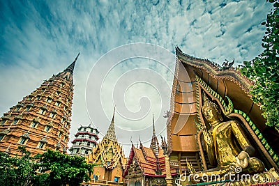 Octagonal pagoda,Chinese Pagoda,Vihara and large golden Buddha statue at Wat Tham SuaTiger Cave Temple,Tha Muang District,Kancha Stock Photo