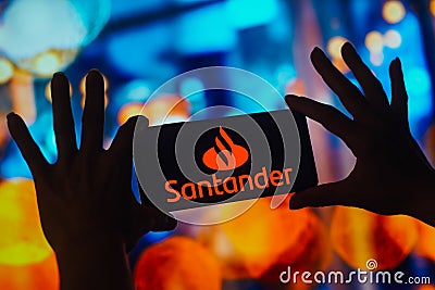 October 24, 2022, Brazil. In this photo illustration, the Santander Group logo is displayed on a smartphone screen Cartoon Illustration