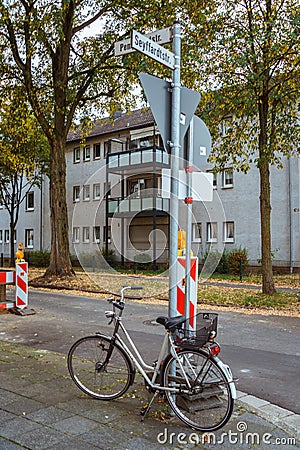 October 21, 2018. City Krefeld Germany. Urban one bike parked without anyone on a sunny day in the fall on a European street Editorial Stock Photo