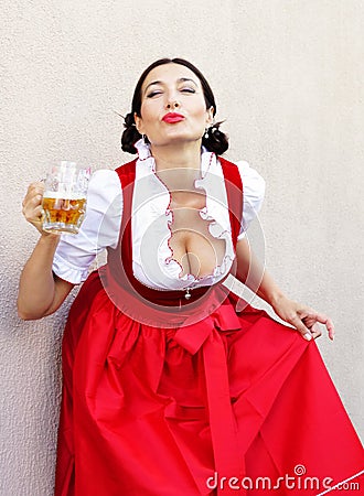 October fest concept.Beautiful german woman in typical oktoberfest dress dirndl Stock Photo