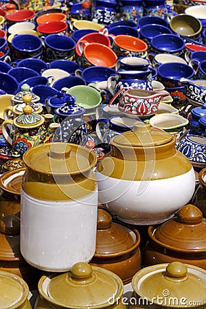 30 October 2021, Pune, India, A street shop with oriental ceramics. Teapots, plates and bowls. Bowls, plates and tea cups in Stock Photo