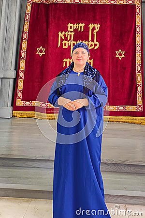 October 5, 2023, Russia, Kaliningrad, new Kaliningrad synagogue, a Jewish woman in the Kisuy Rosh headdress at the ark Editorial Stock Photo