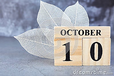 October 10th. Hello October, Cube wooden calendar showing date on 10 October. Stock Photo