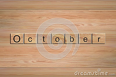 October word written on wood block. Stock Photo