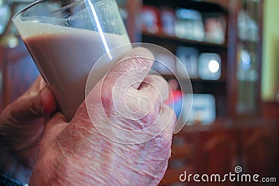 Octogenarian take a nutrient packed shake Stock Photo