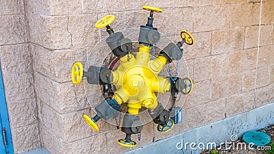 Octuplets Wall Mounted Fire Hydrant Valves Stock Photo