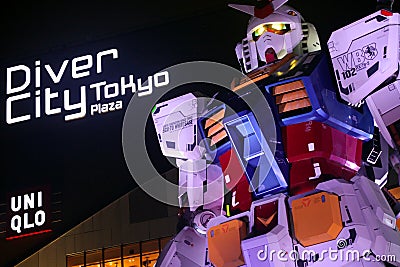 Odaiba Diver City Tokyo Plaza shopping mall and real-size Gundam robot in Tokyo, Japan Editorial Stock Photo