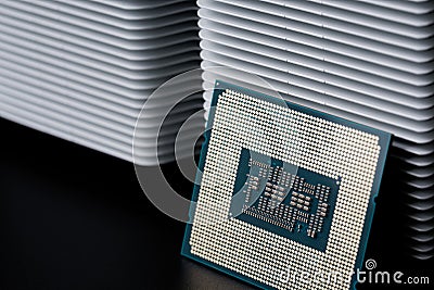 odern personal computer processor â€“ CPU, white metal radiator for cooling it. Heat dissipation, thermal conductivity and Stock Photo