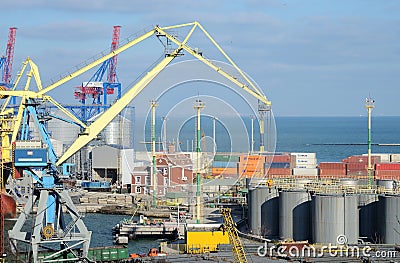 Odessa cargo port with grain dryers,transport containers and colourful cranes,Ukraine Editorial Stock Photo