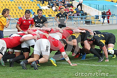 ODESSA, UKRAINE -2020.10.17 - Final of Ukrainian rugby championship CREDO Odessa - red, OLYMPIK Kharkiv black Intense struggle Editorial Stock Photo