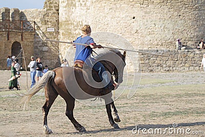 ODESSA, UKRAINE - JULY 20, 2019: Equestrian traditional competitions at knight`s festival in fortress Akkerman Belgorod-Dniester. Editorial Stock Photo