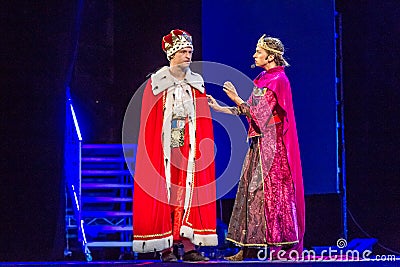ODESSA, UKRAINE - July 14, 2019: Group of actors in action on stage of Odessa Opera and Ballet Theater during performance of Editorial Stock Photo