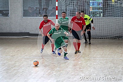 Odessa, Ukraine- May 29, 2020: Cup playoff match match in futsal among veterans 50+. Futsal on large stage of sports hall, Editorial Stock Photo